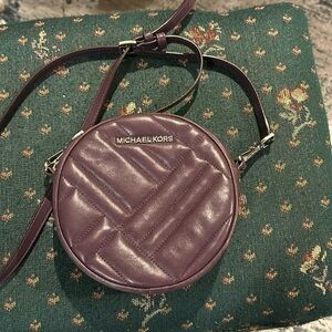 Michael Kors Vivian canteen 6 inch round, Crossbody bag and plum leather